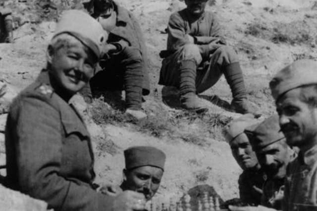 Flora Sandes, who rose from private to sergeant-major in the Serbian army, playing chess with her Serbian comrades. After the war ended, she was promoted to lieutenant