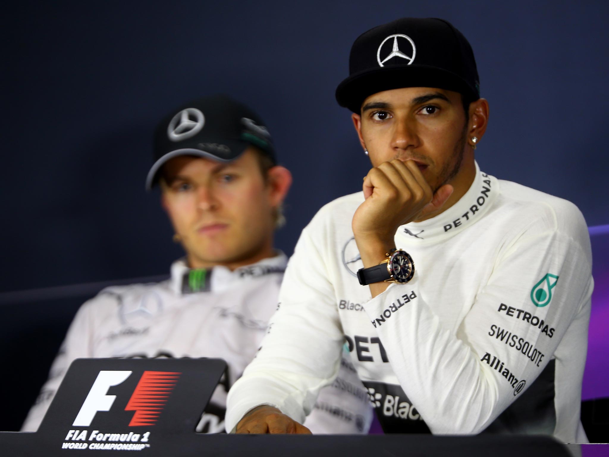 Nico Rosberg looks at Lewis Hamilton following the Spanish Grand Prix