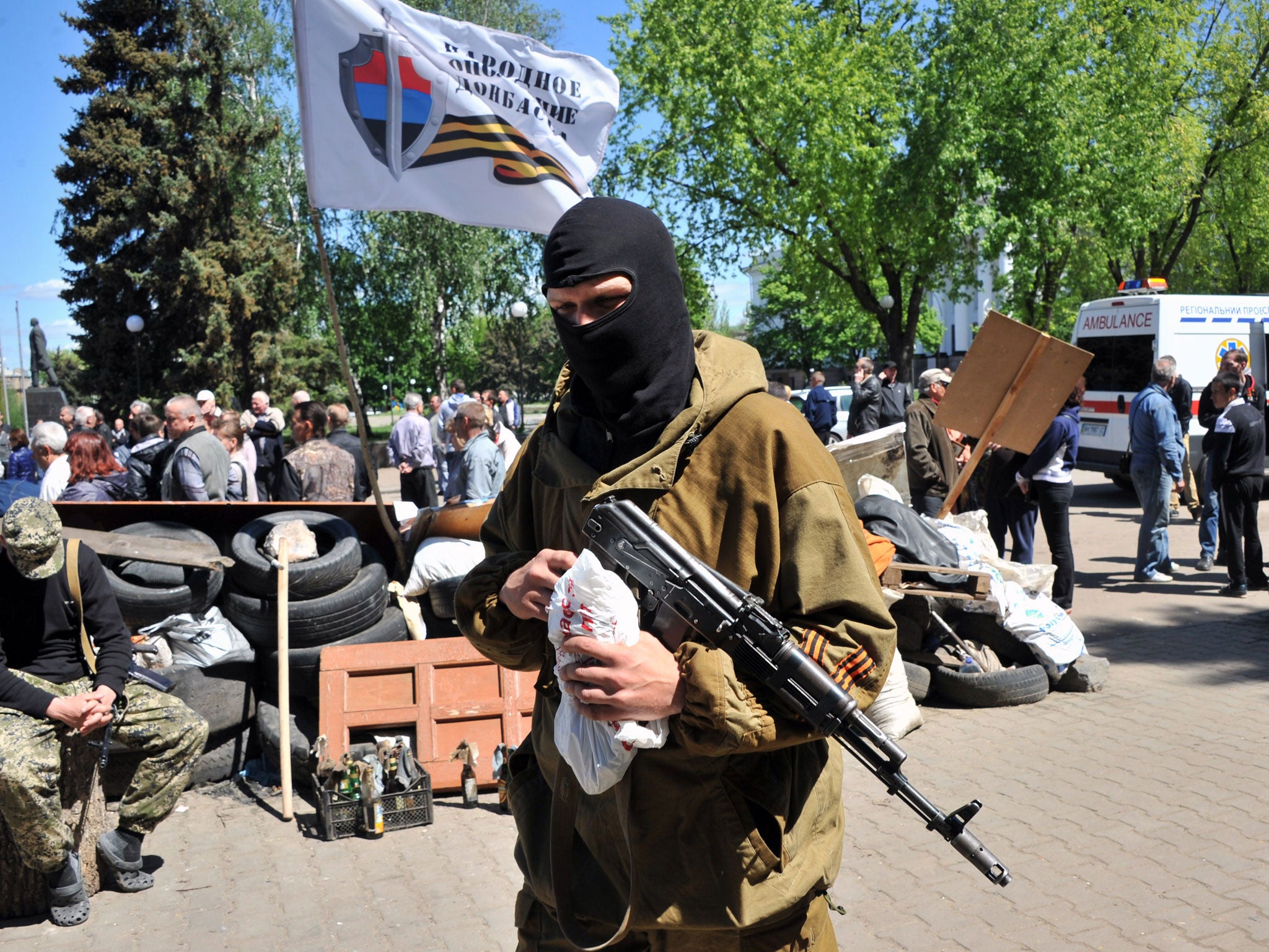 Armed pro-Russian militiants guard a barricade outside the regional state building in Kramatorsk, eastern Ukraine.
