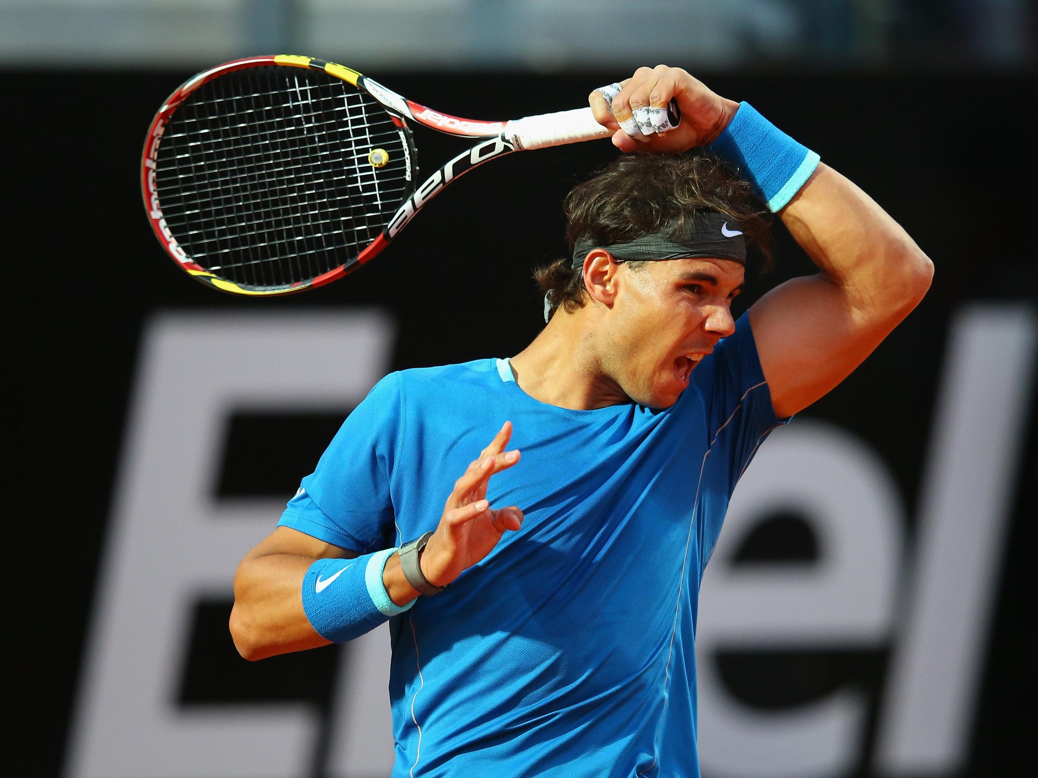 Rafael Nadal in action in Rome during his second round match with Giles Simon