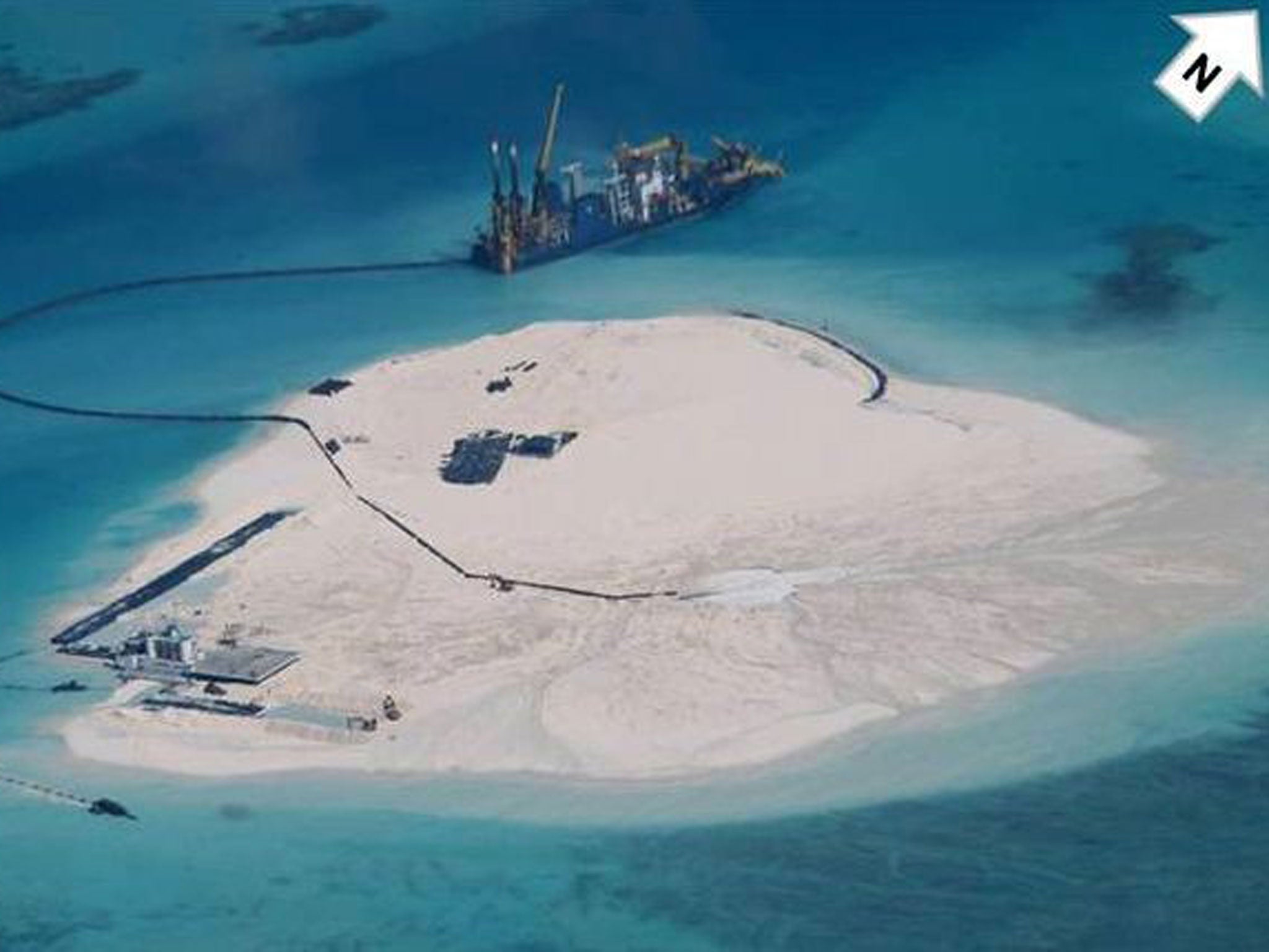 Image released by the Philippines government the alleged reclamation by China on what is internationally recognised as the Johnson South Reef in the South China Sea