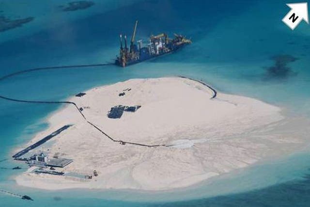 Image released by the Philippines government the alleged reclamation by China on what is internationally recognised as the Johnson South Reef in the South China Sea