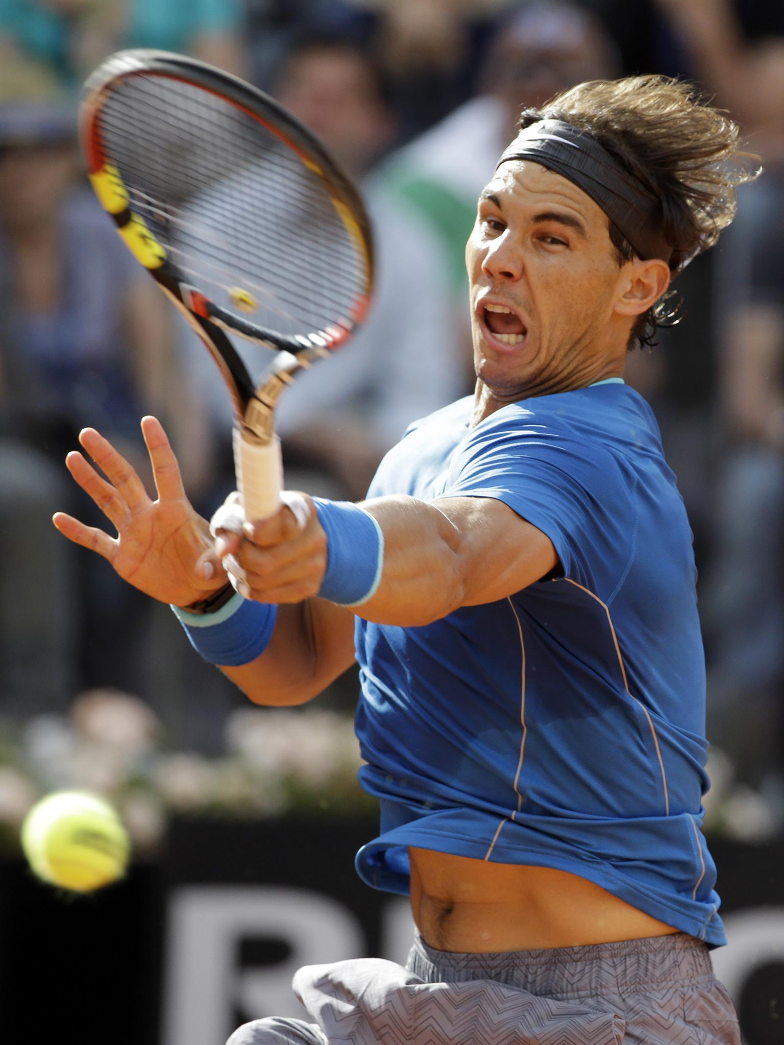 Rafael Nadal on his way to victory over Mikhail Youzhny at the Italian Open yesterday