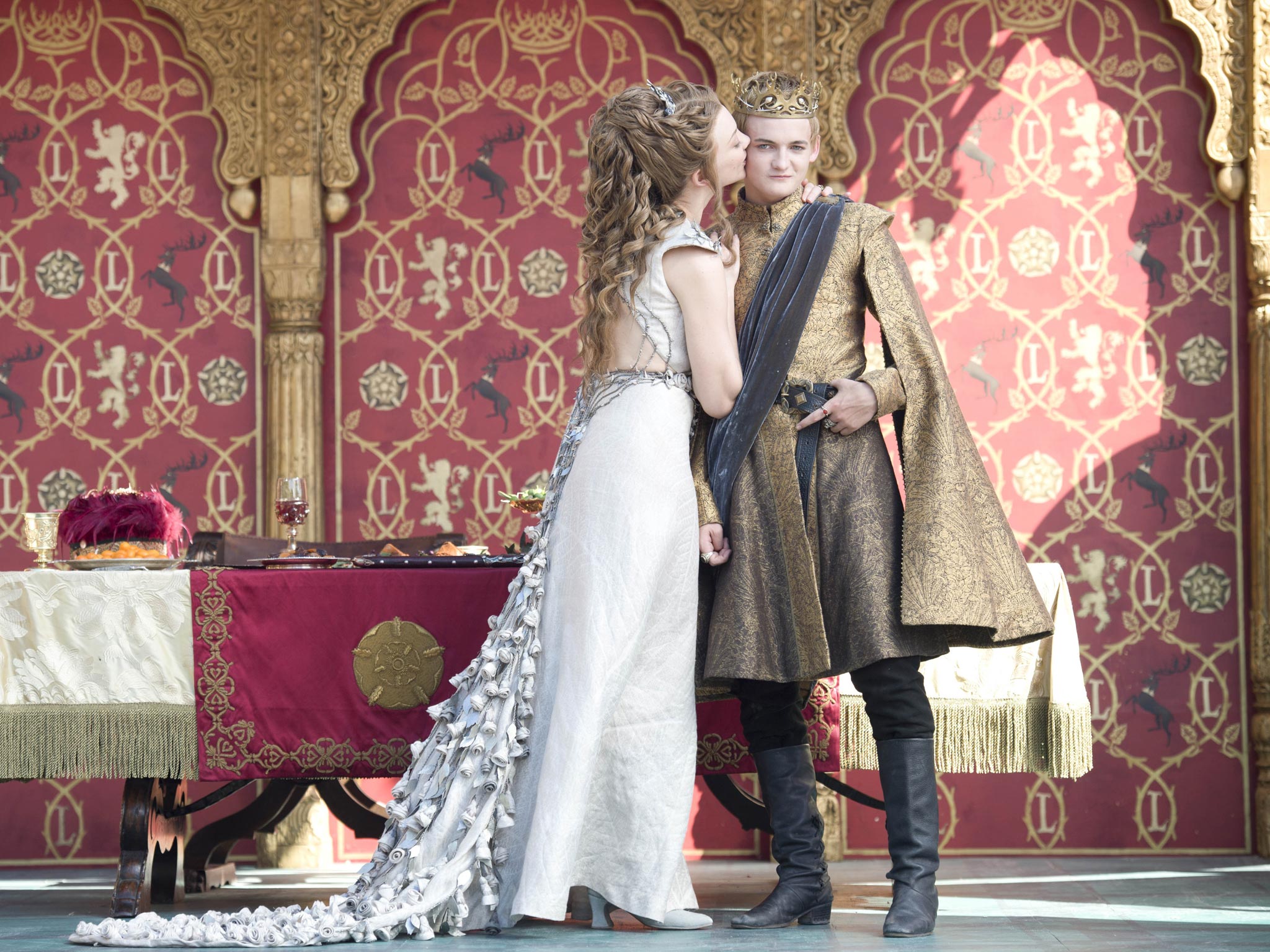 Jack Gleeson as Joffrey Baratheon and Natalie Dormer as Margaery Tyrell