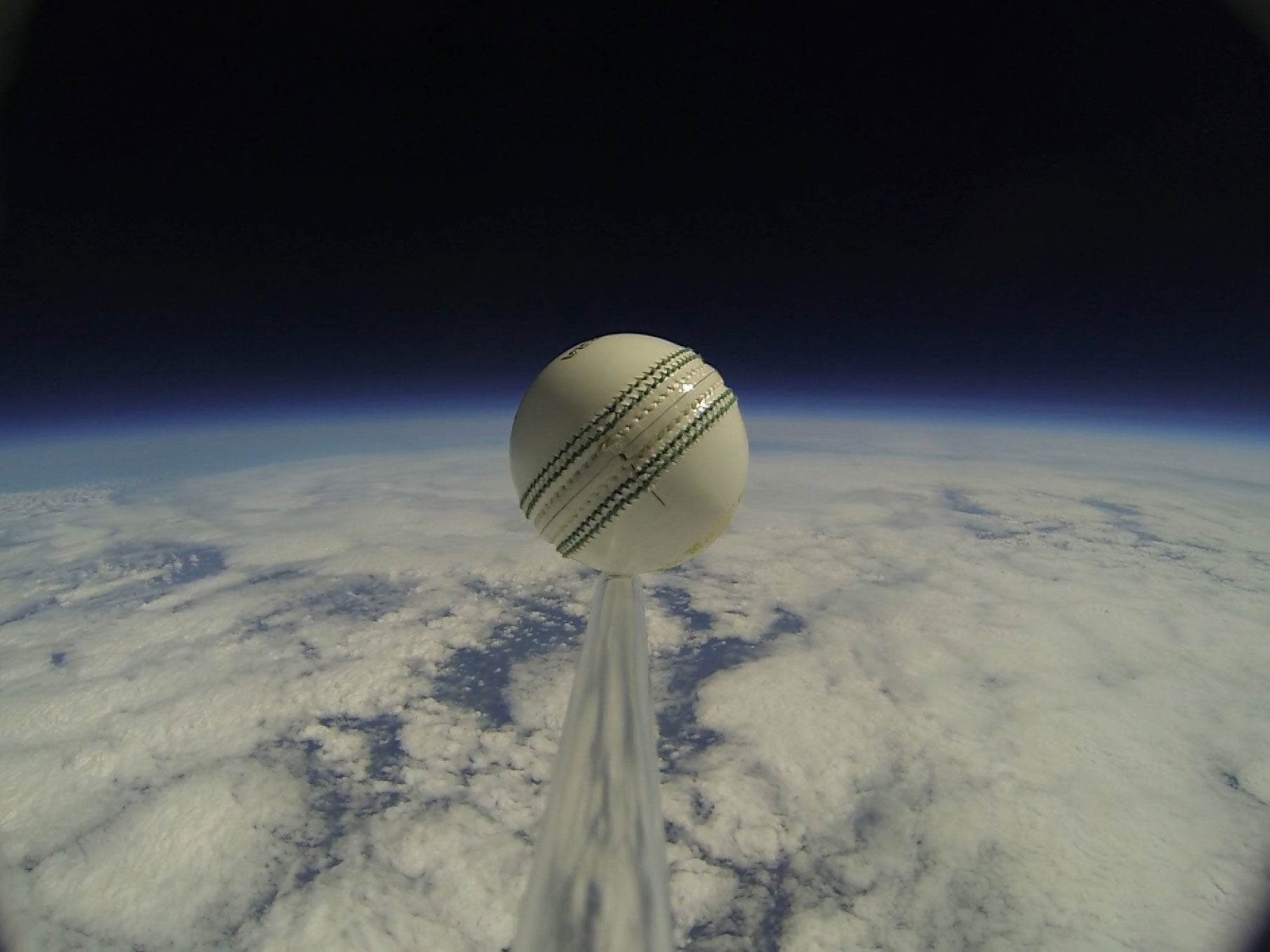 The cricket ball was attached to a helium balloon.