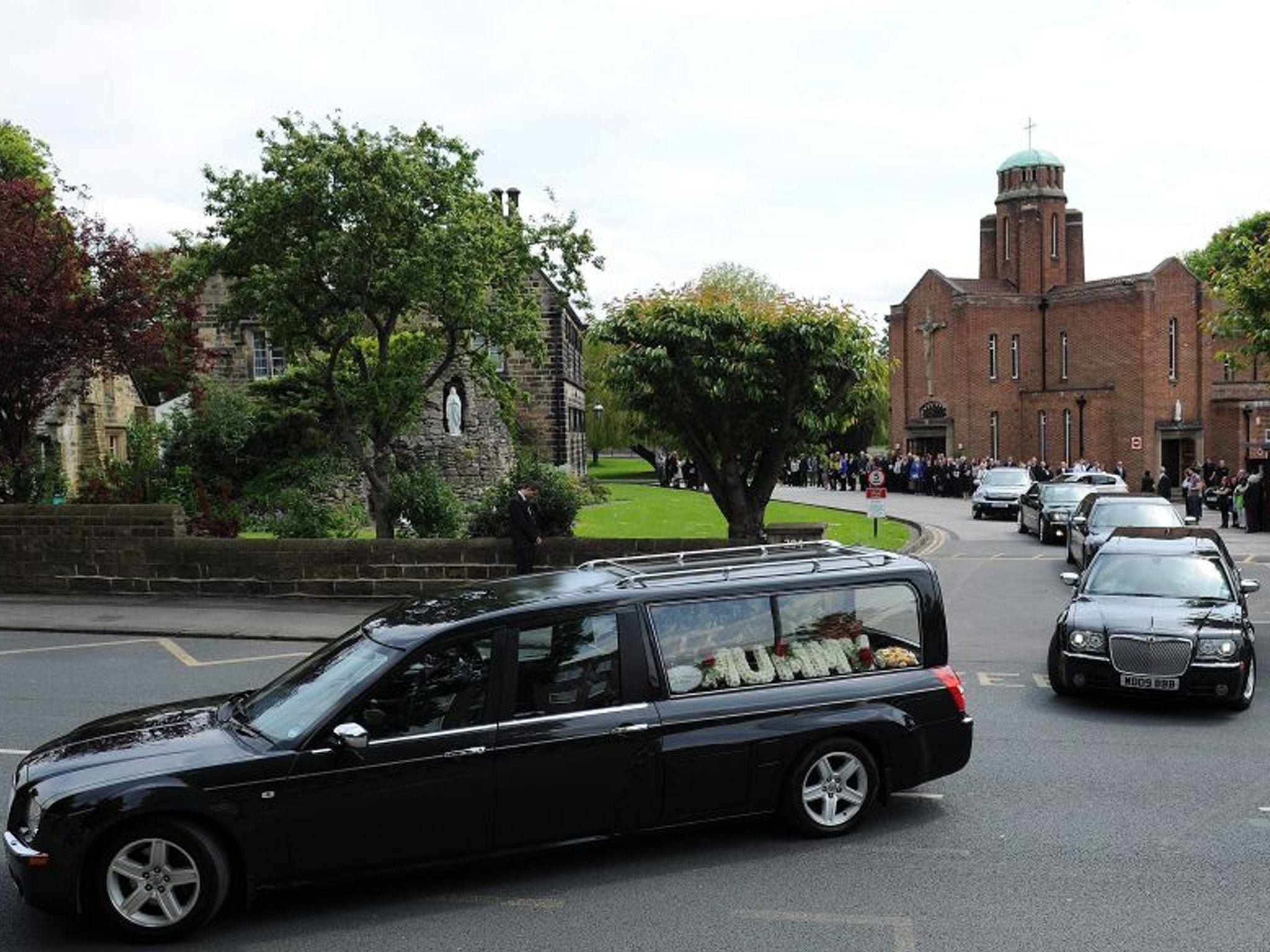 The Hearse carrying the coffin of Ann Maguire (EPA)