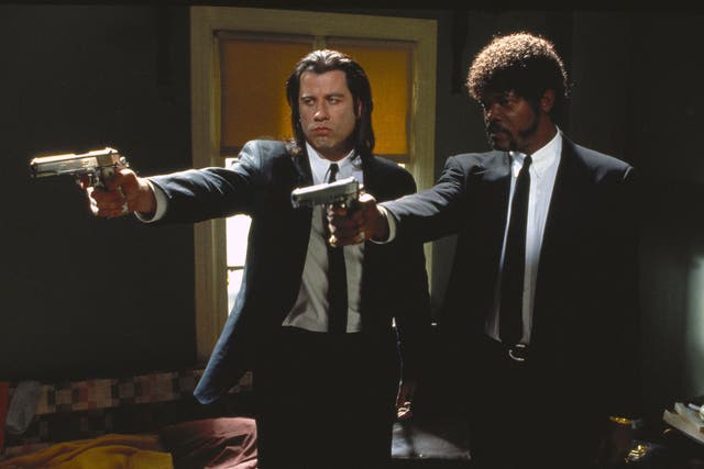 John Travolta as Vincent Vega and Samuel L Jackson as Jules Winnfield in Quentin Tarantino’s 1994 Palme d’Or winner, Pulp Fiction