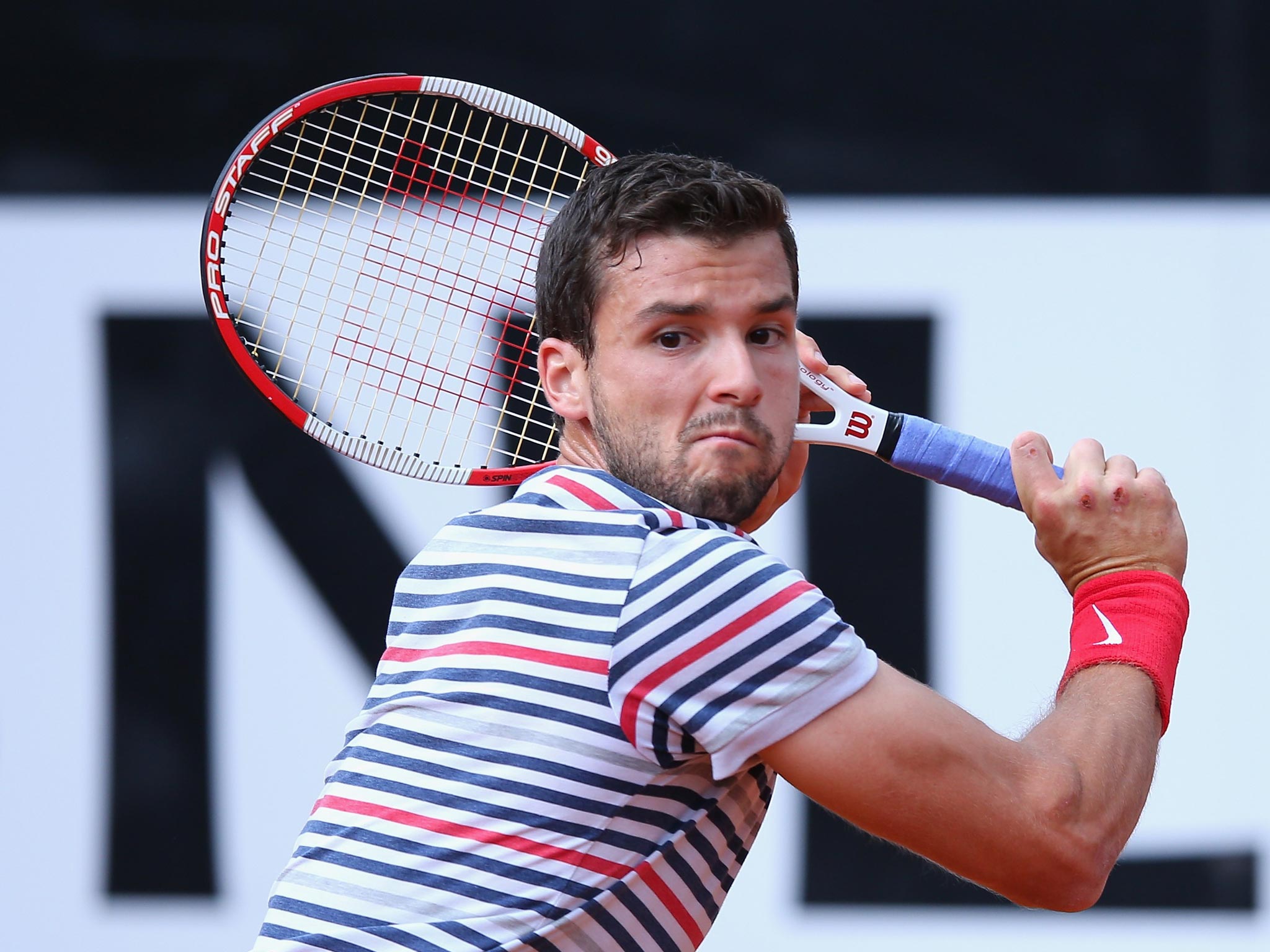 Grigor Dimitrov on his way to a curtailed birthday
victory over Tommy Haas