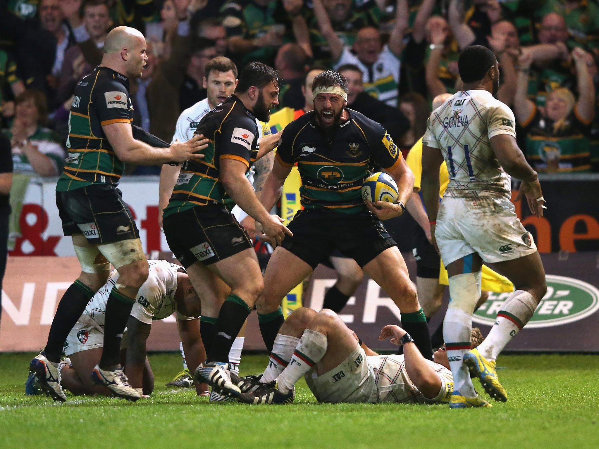 Tom Wood roars his delight after claiming the match-winning try last night