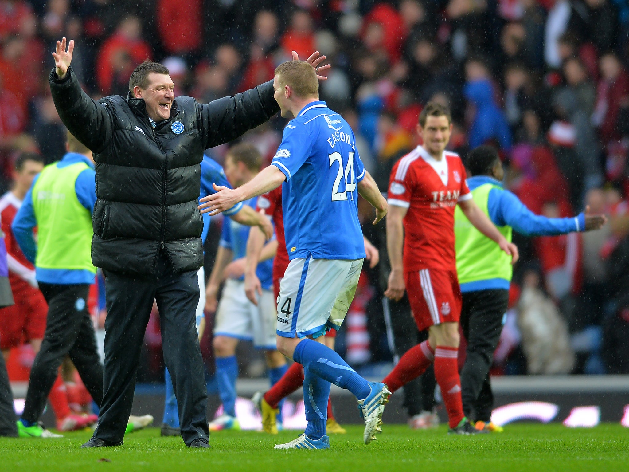 St Johnstone manager Tommy Wright celebrates with Brian Easton after winning the Scottish Cup final