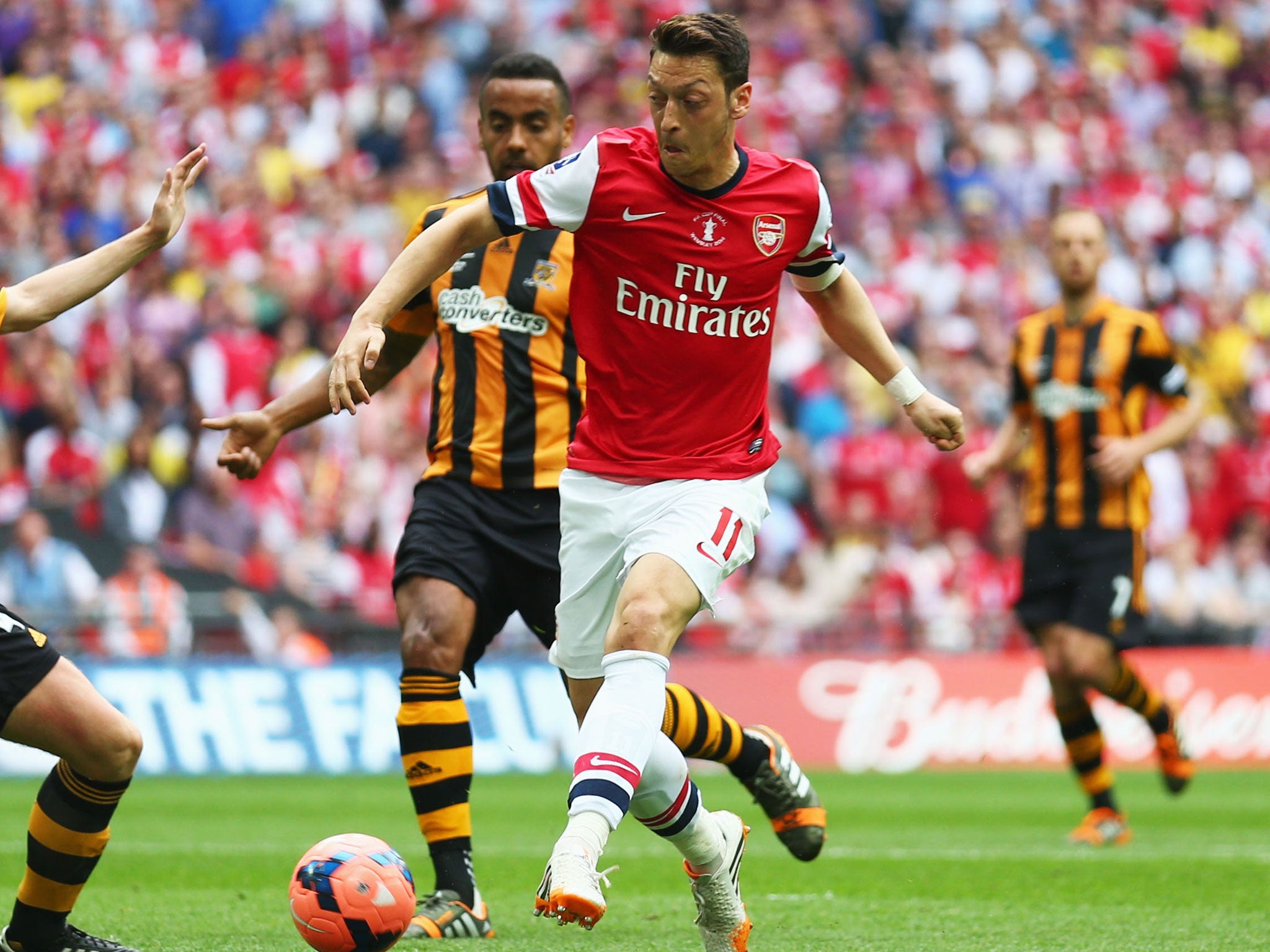 Arsene Wenger said Fabregas would struggle to get in the team because the Gunners have Mesut Ozil in that position