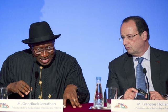 Nigeria's president, Goodluck Jonathan, with François Hollande at the Paris summit