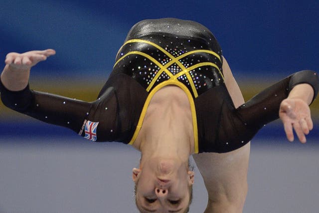Head start: Hannah Whelan on the beam put GB in a early good position