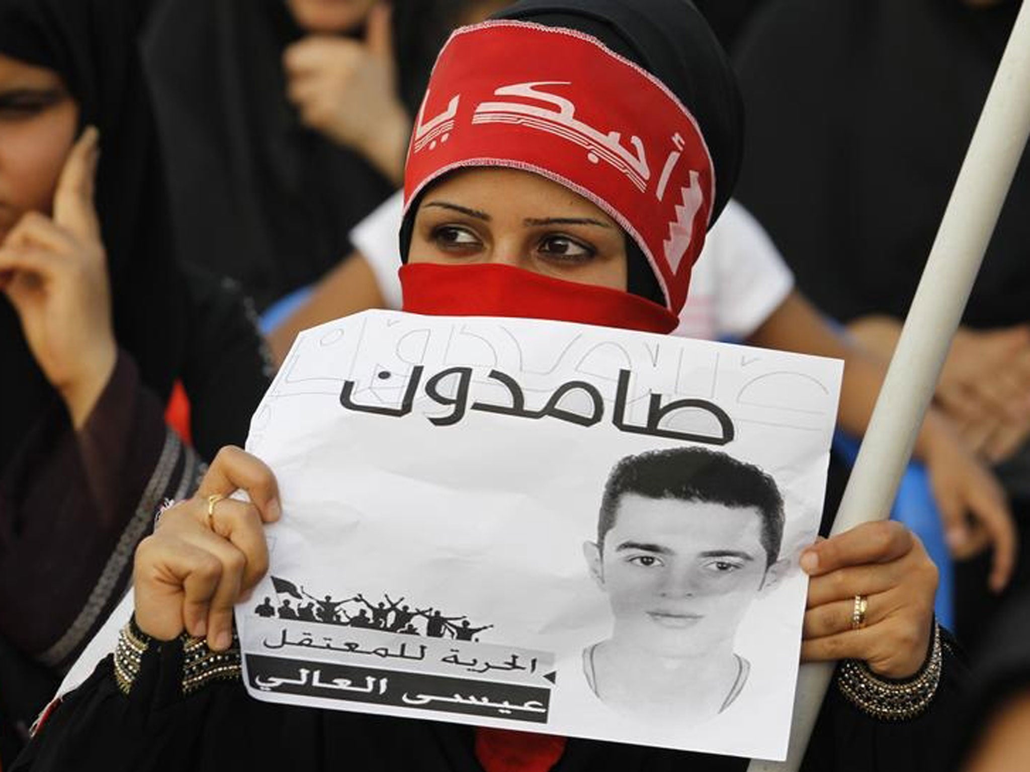 A Bahraini protester calls for Isa Alaali’s release