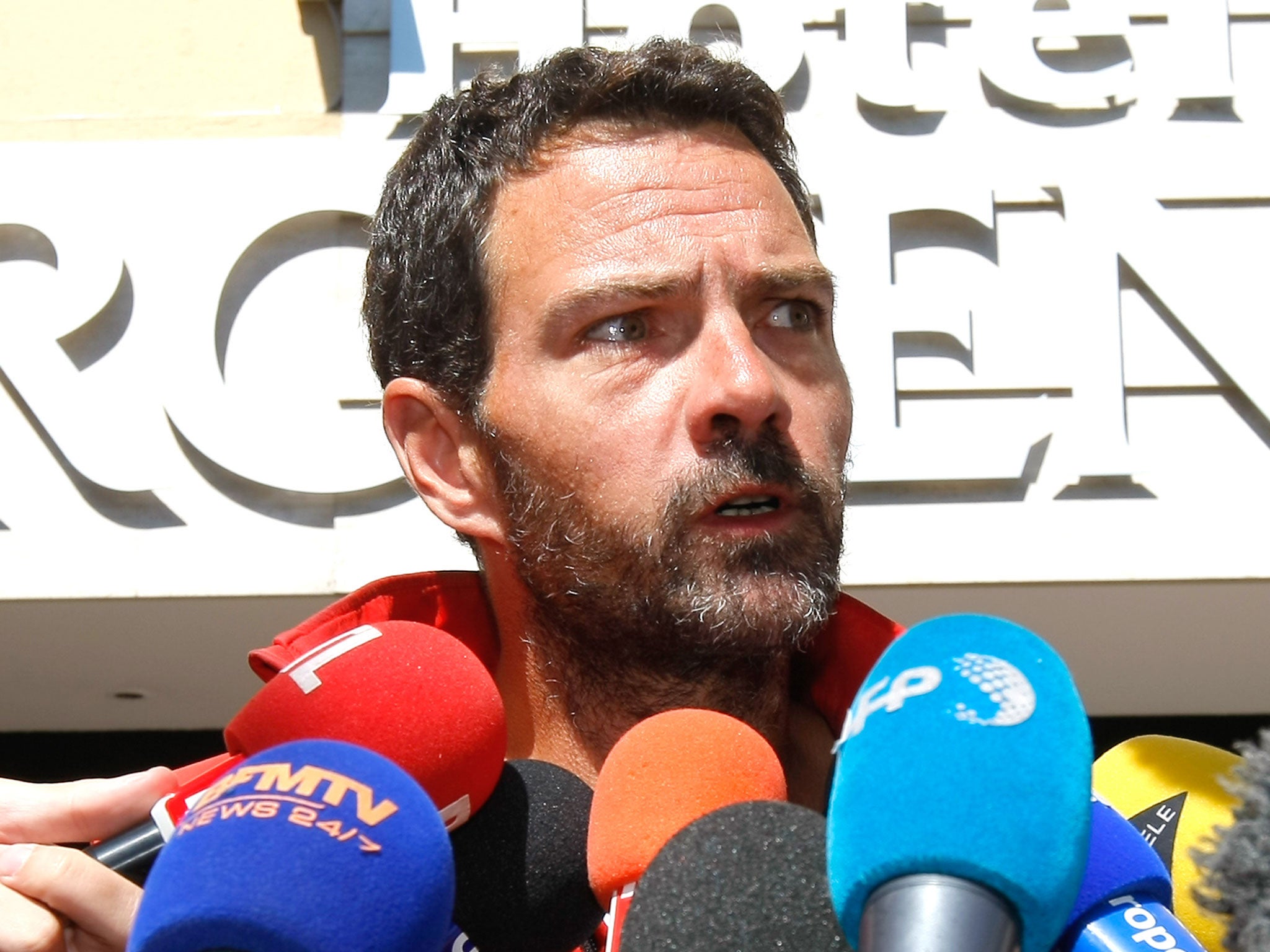 Jérôme Kerviel held a press conference a few yards inside Italy, demanding a meeting with the French President