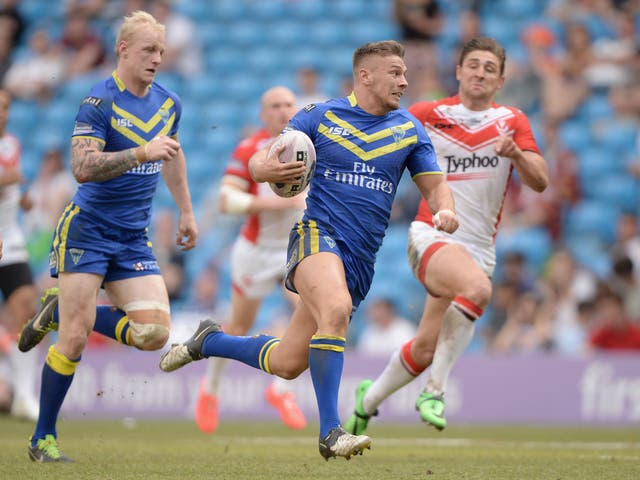 Matthew Russell sprints clear to score a try for Warrington