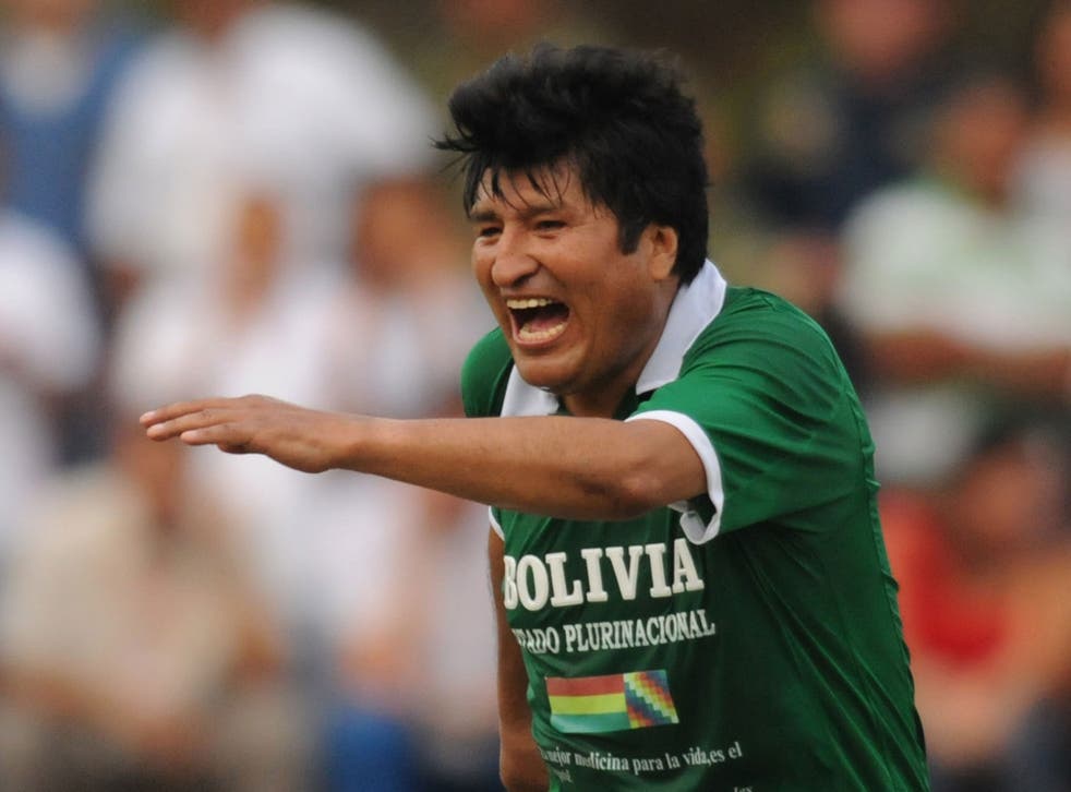 Bolivia's President Evo Morales celebrates his team's goal during a friendly football match against Colombia
