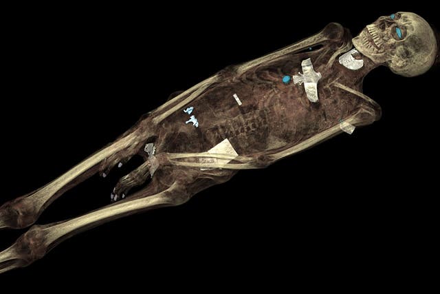 Close to the bone: CT scan 3D visualisation of the mummified remains of Tayesmutengebtiu, also called Tamut, with her skeleton and amulets