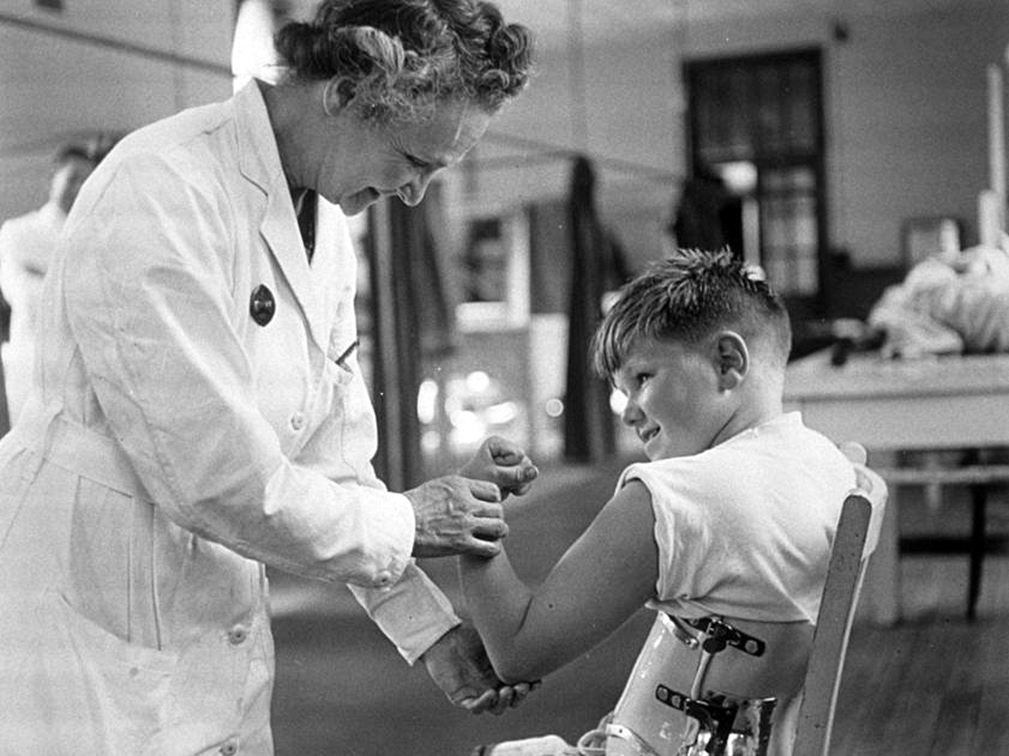 Caring hands: a hospitalised child with polio in 1947