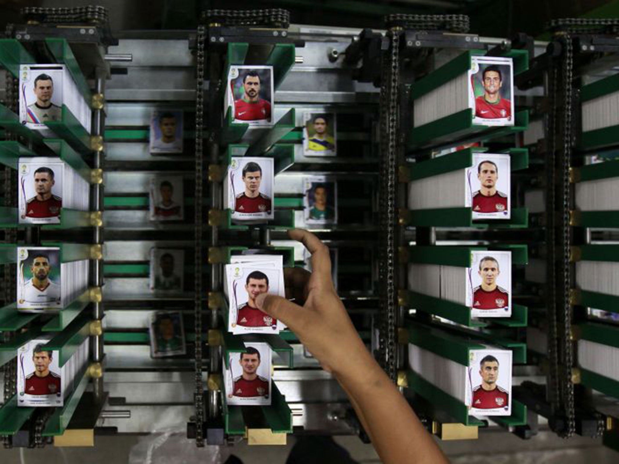 World Cup booty: the assembly line of a Panini factory