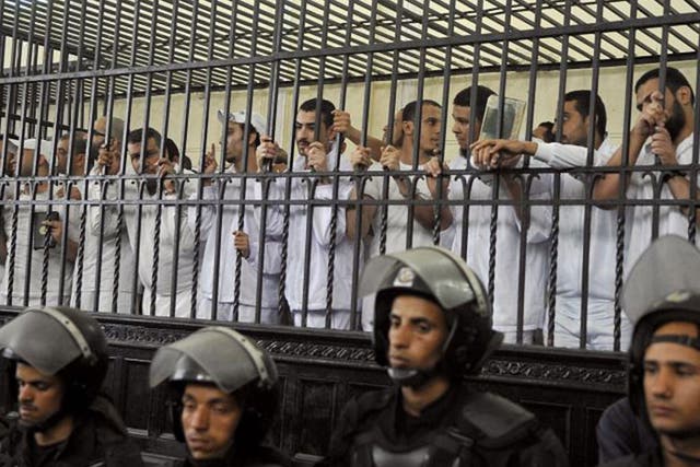 Defendants in court yesterday during their trial over violence in Alexandria last year following the ousting of Mohamed Morsi. Ahmed Diini was arrested shortly after Mr Morsi’s Muslim Brotherhood was deposed