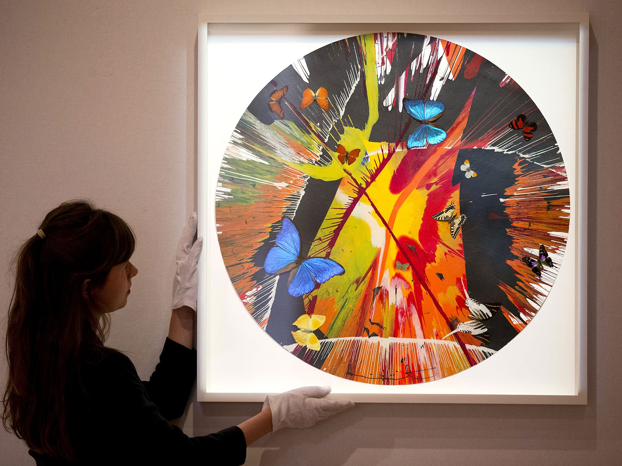 Sutherland mimicked Hirst's iconic round "spin" paintings, such as the one pictured here