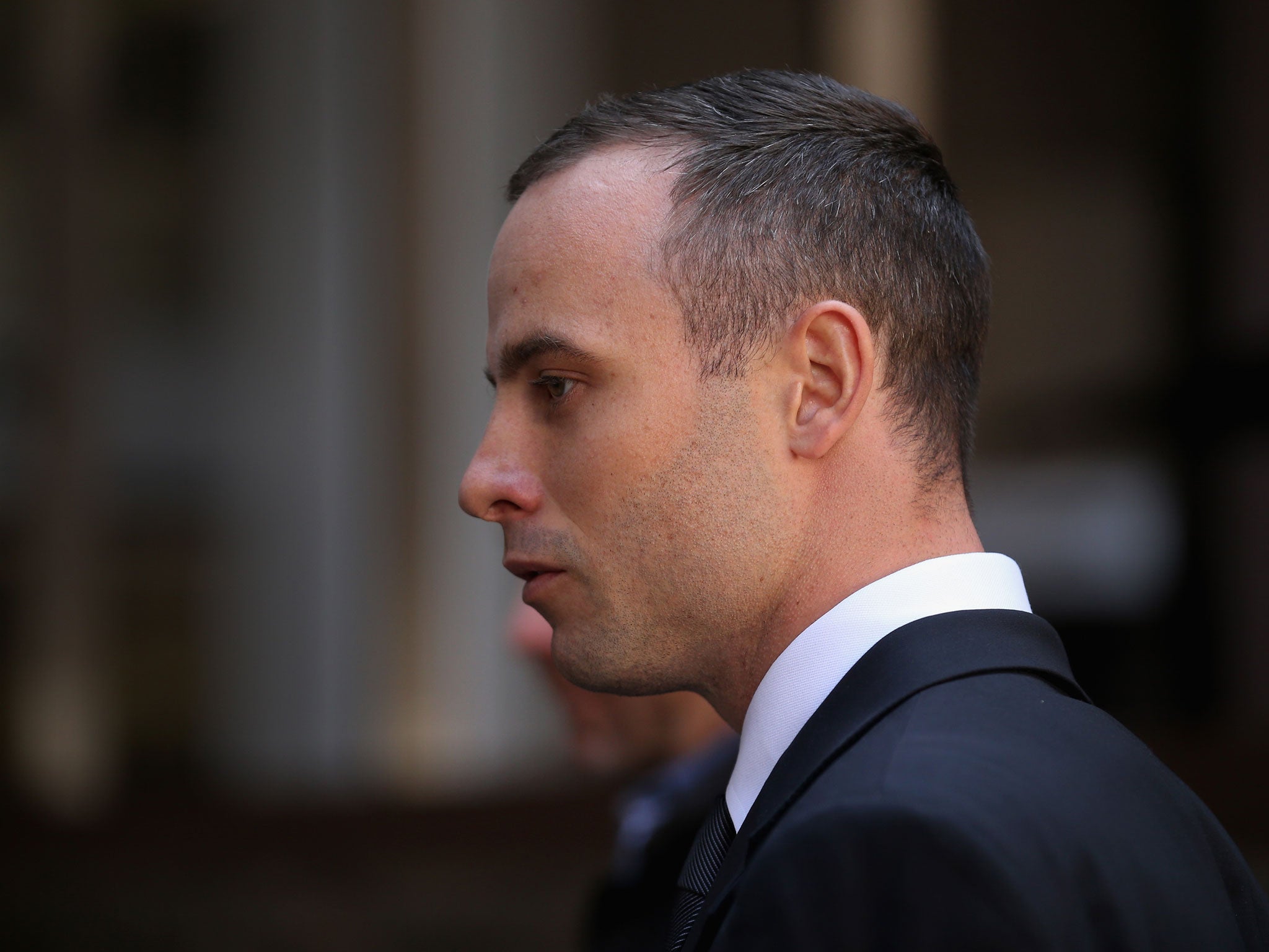 Oscar Pistorius leaves North Gauteng High Court after the judge ordered that he should undergo mental evaluation