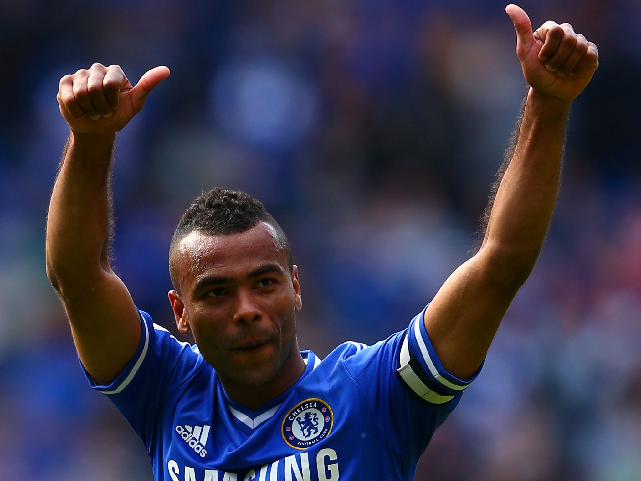 Ashley Cole salutes the fans on his last game for Chelsea
