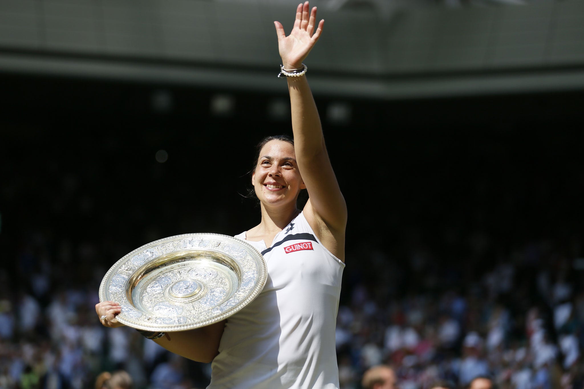 Marion Bartoli after winning Wimbledon in 2013