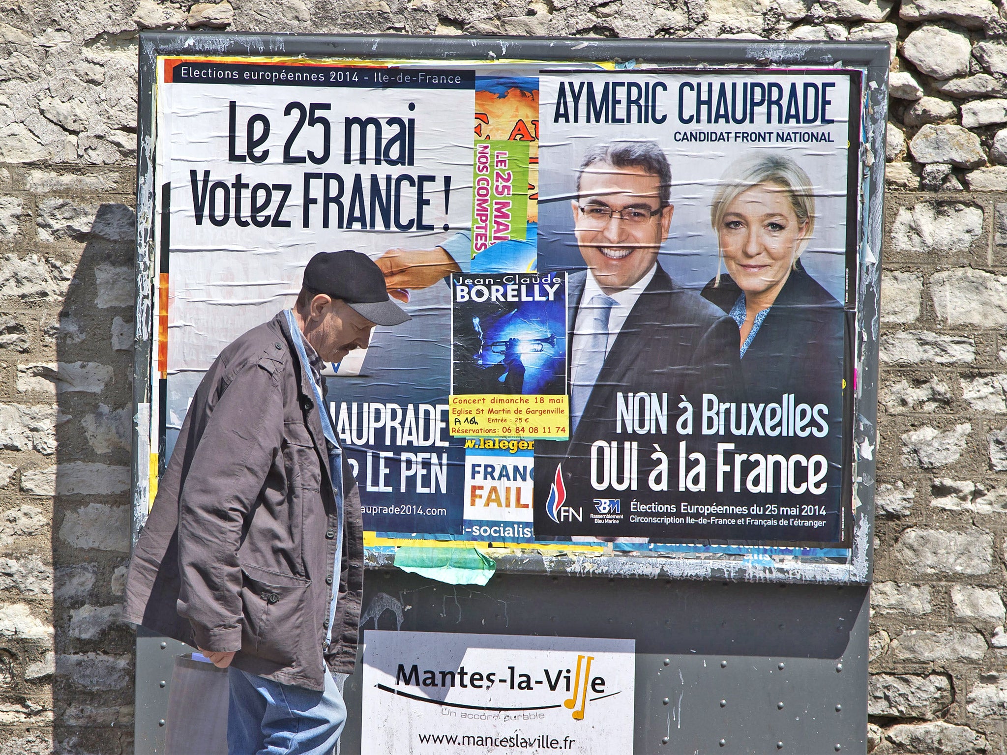 A Front National (FN) poster featuring its leader, Marine Le Pen, in Mantes la Ville, north-west of Paris