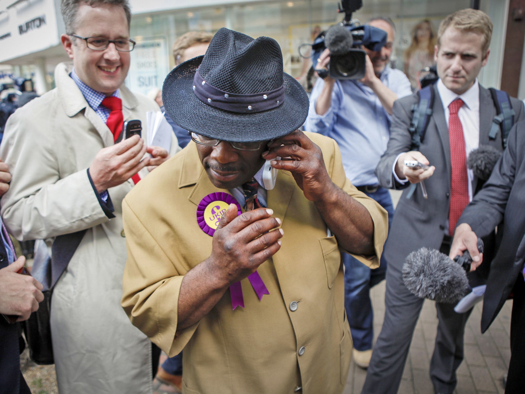 Ukip candidate Winston Mackenzie takes a call regarding the whereabouts of leader Nigel Farage in Croydon