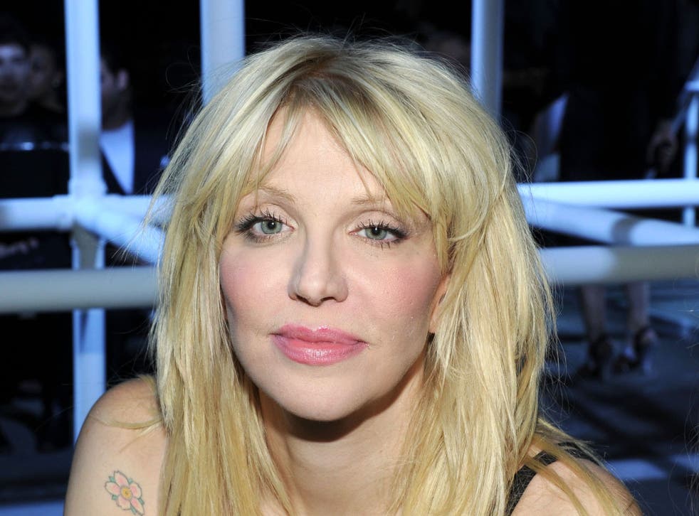 Courtney Love claims her car was ambushed in Paris 