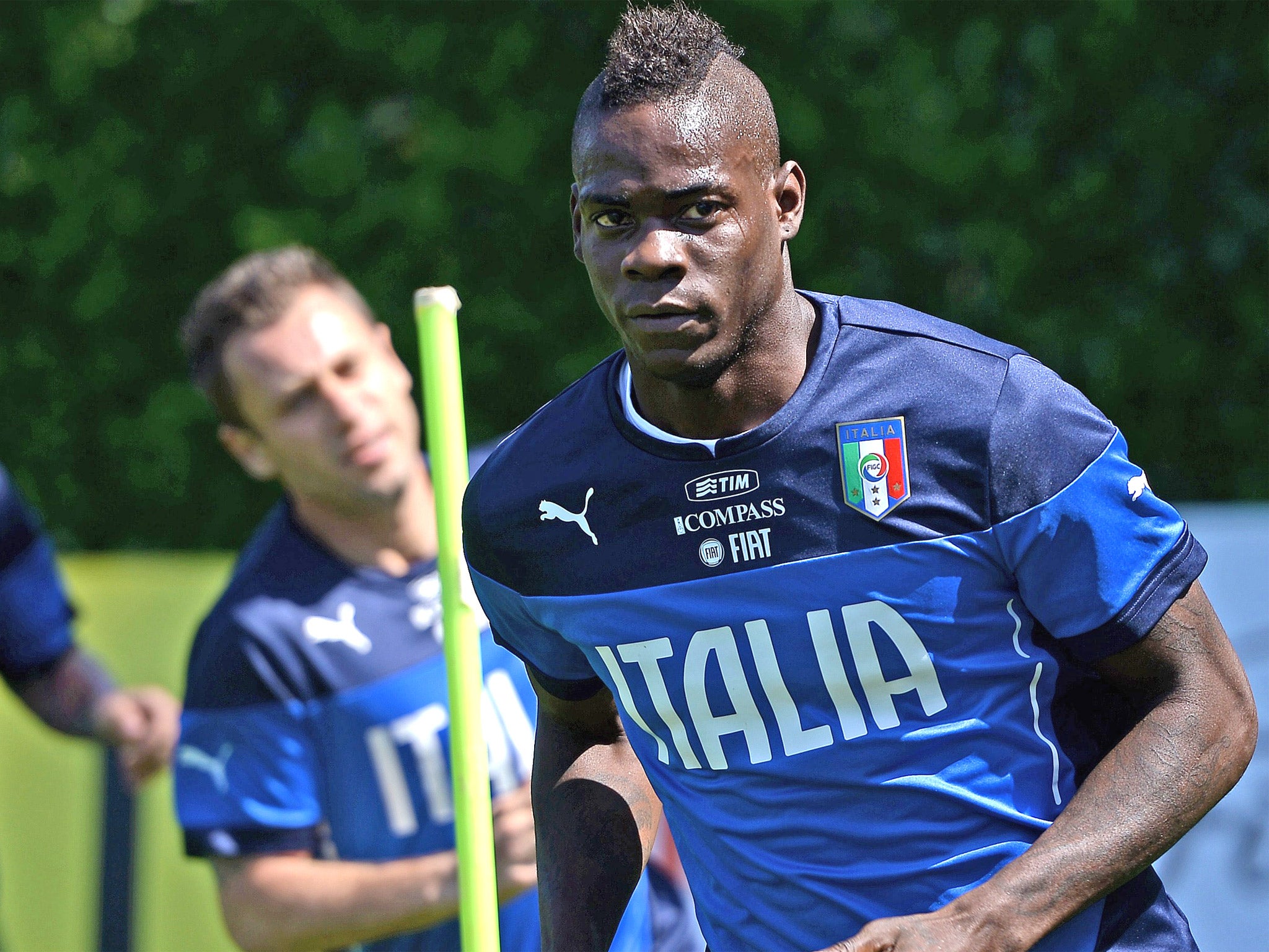 Mario Balotelli (right) did not let the insults get to him, said a team-mate