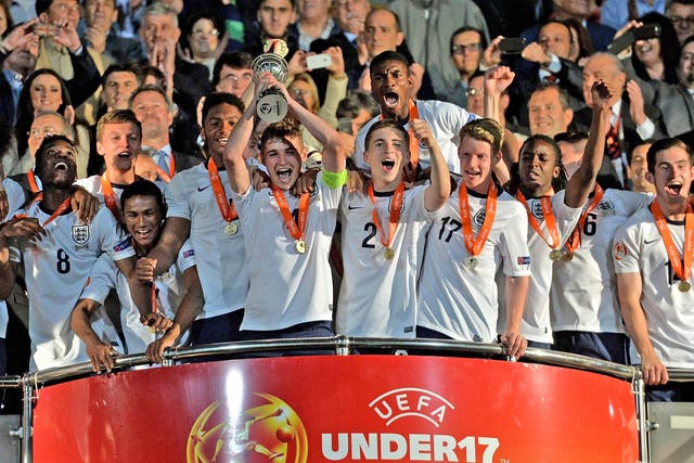 England players celebrate with the trophy after winning the UEFA Under-17 European Championship