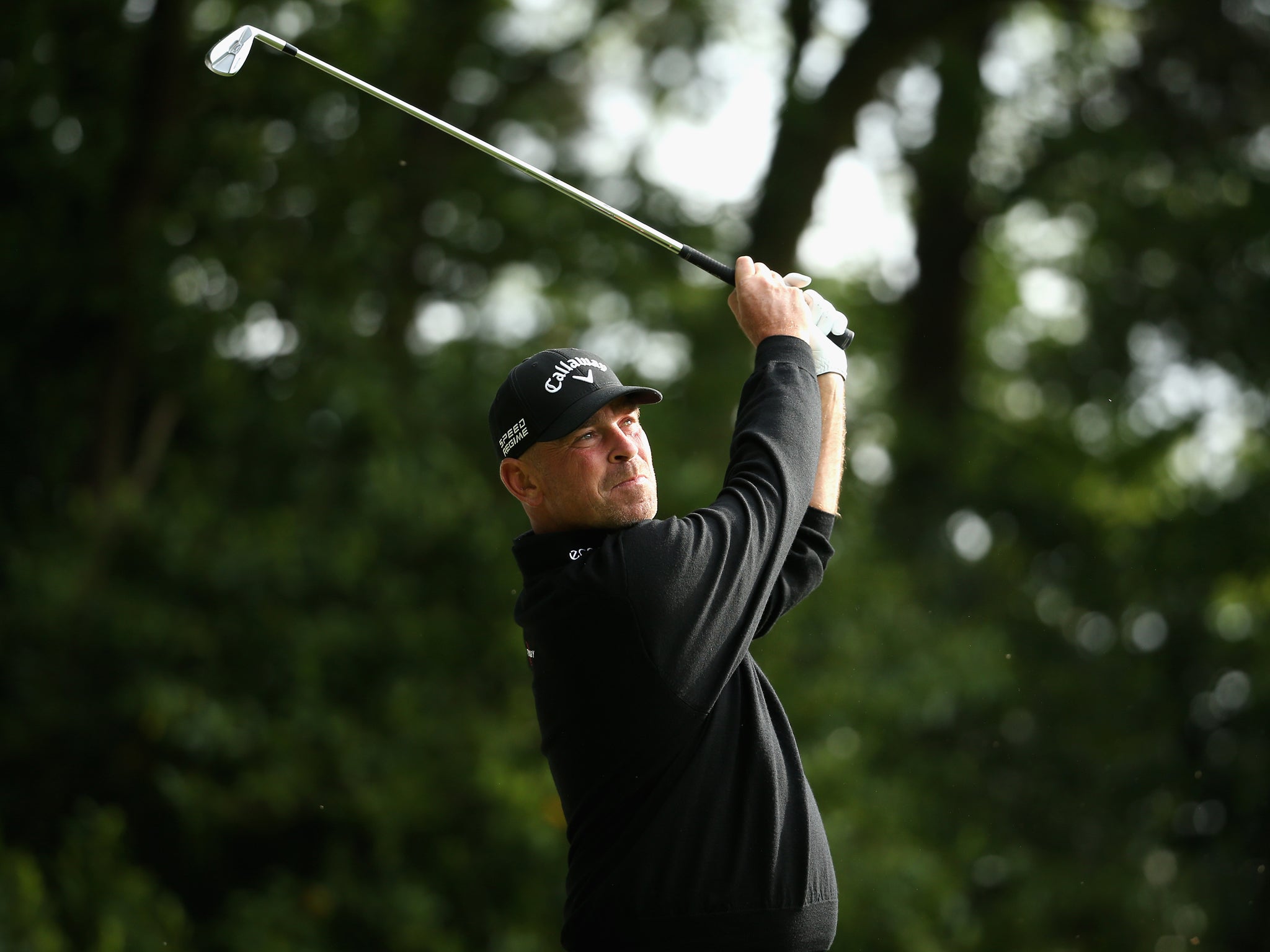 Thomas Bjorn of Denmark tees off on the 2nd hole during day one of the BMW PGA Championship at Wentworth on May 22 as he sets the early pace going eight-under through 14
