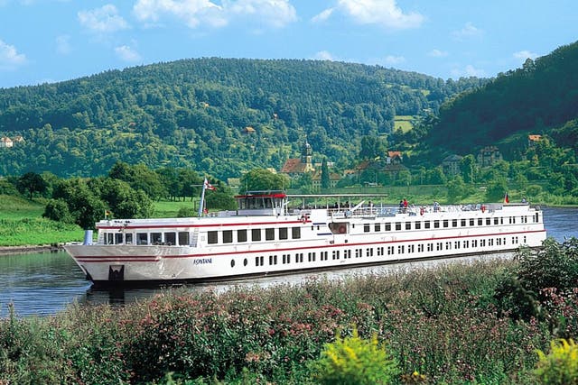 All aboard: Viking's luxury 'Fontane' ship passes down the Elbe