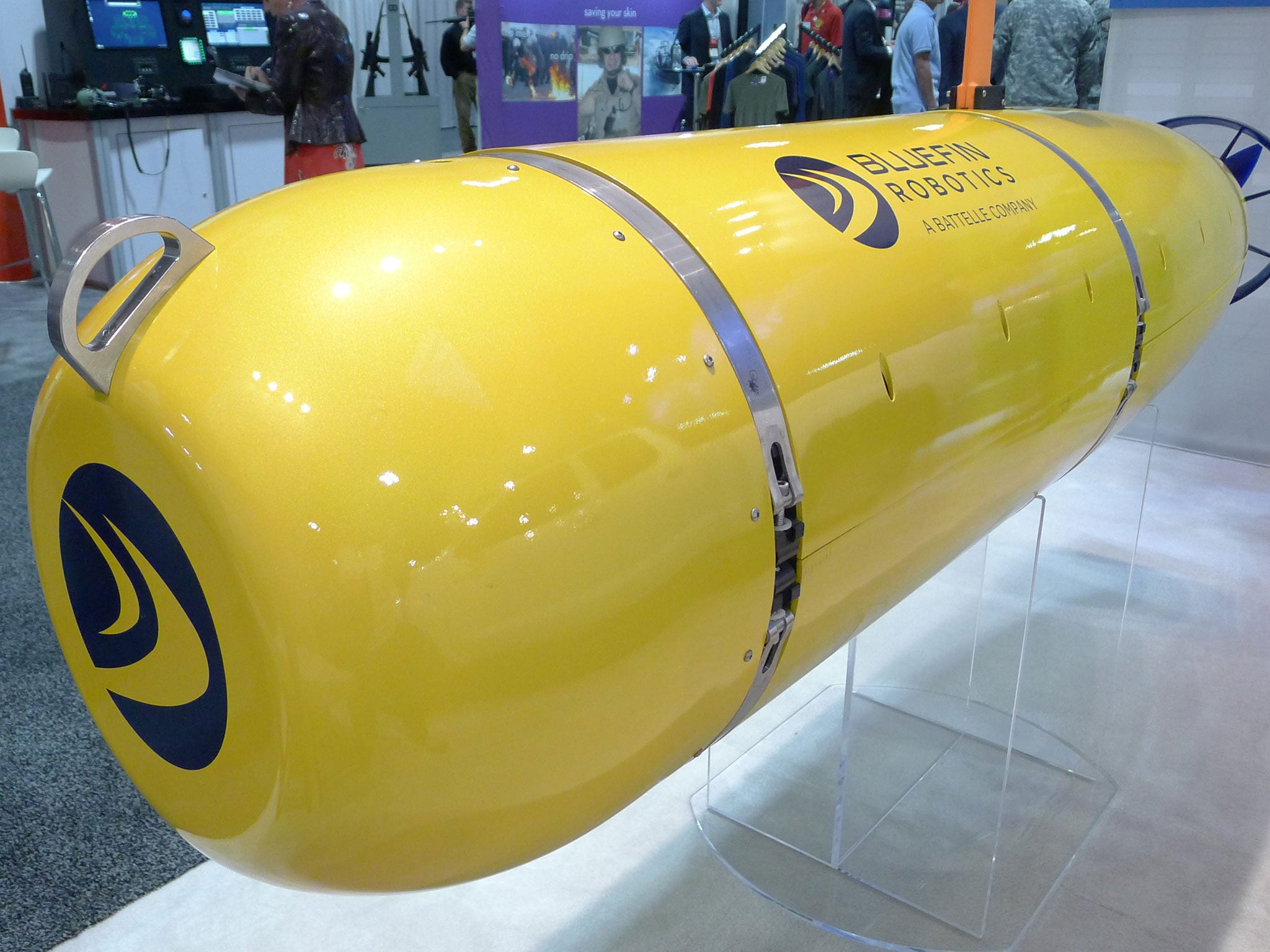 In this May 20, 2014 photo, a Bluefin 21, a torpedo-shaped underwater robot like that used in the hunt for the missing jet MH370, is seen on display at the Special Operations Forces Industry conference in Tampa, Florida