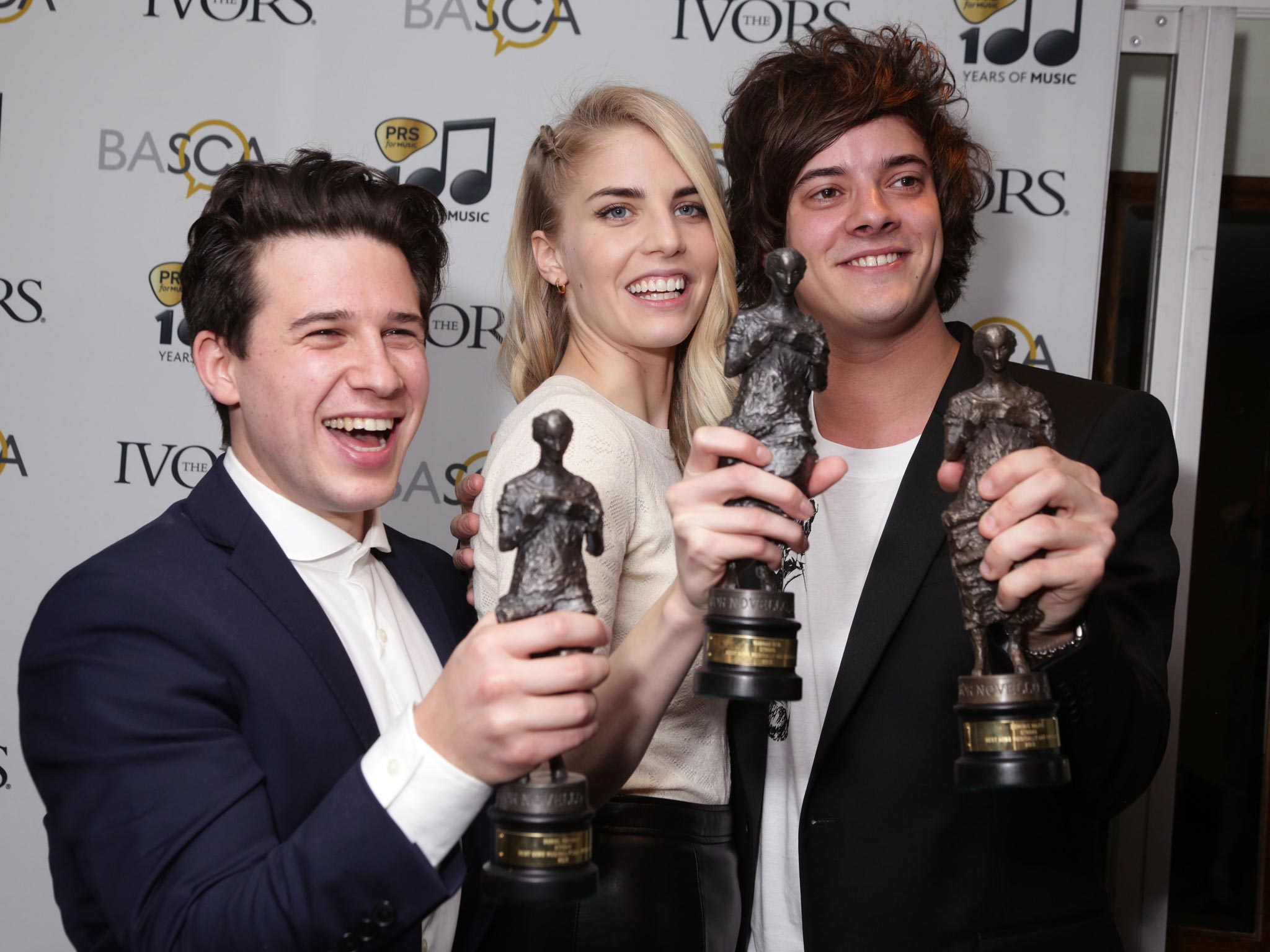 London Grammar with their Best Song musically and lyrically award at the Ivor Novello Awards