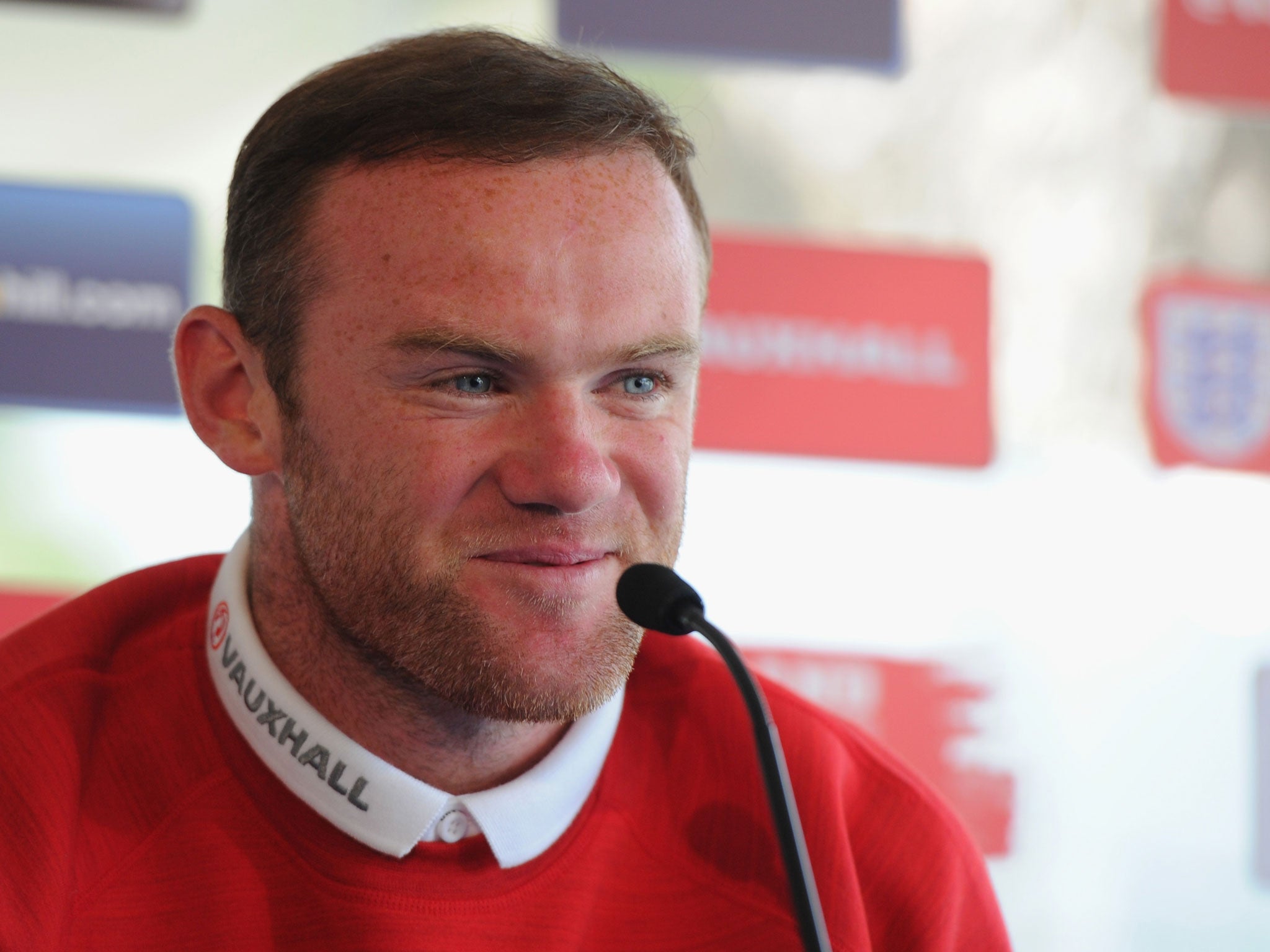 Wayne Rooney addresses the media at England's training camp in Portugal