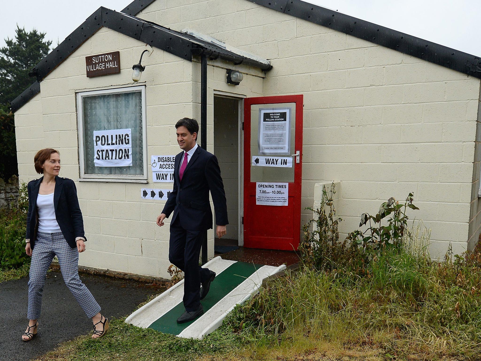 Ed Miliband and his wife, Justine Thornton, after voting in Leeds