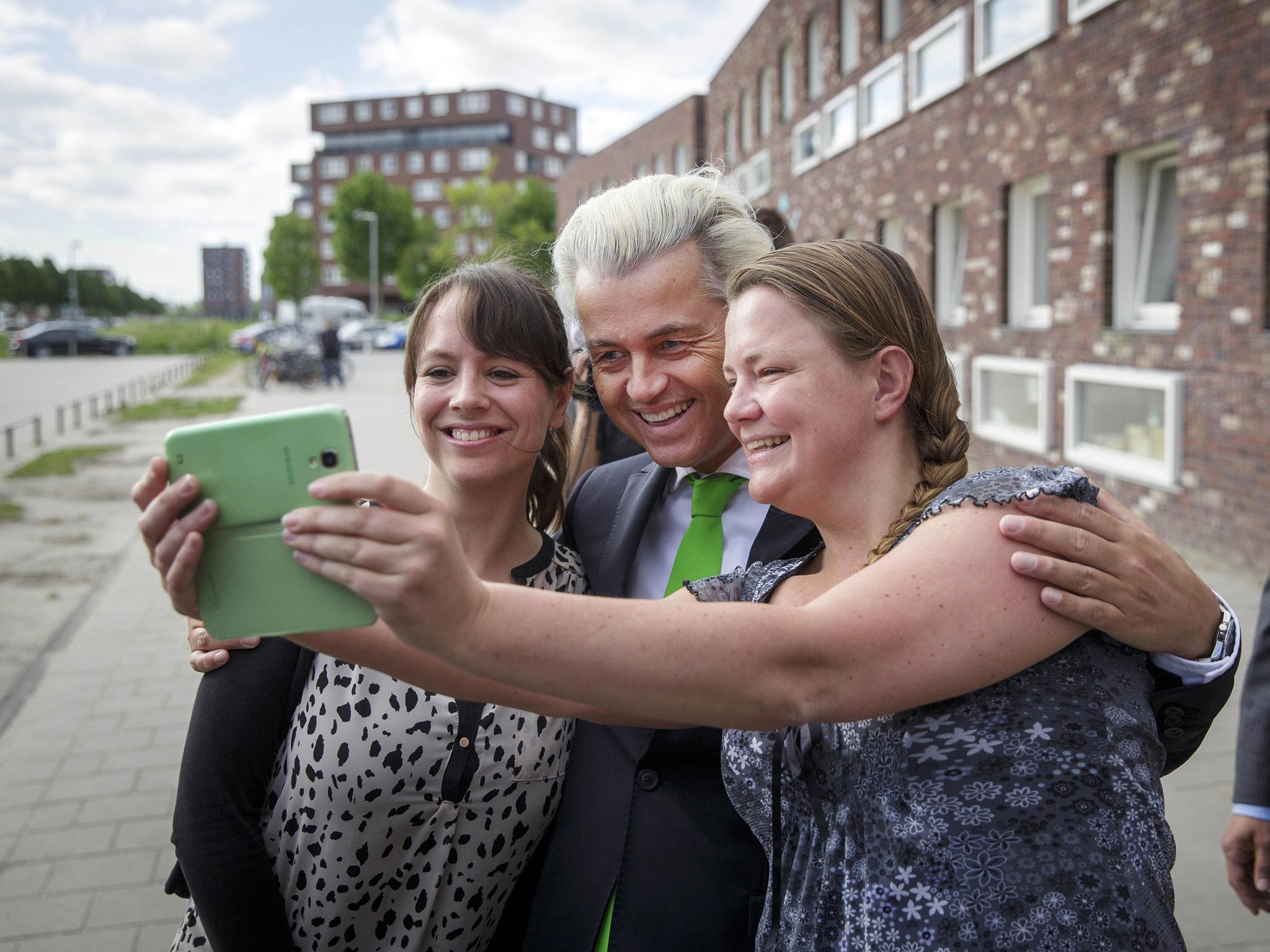 Geert Wilders, poses with supporters in The Hague