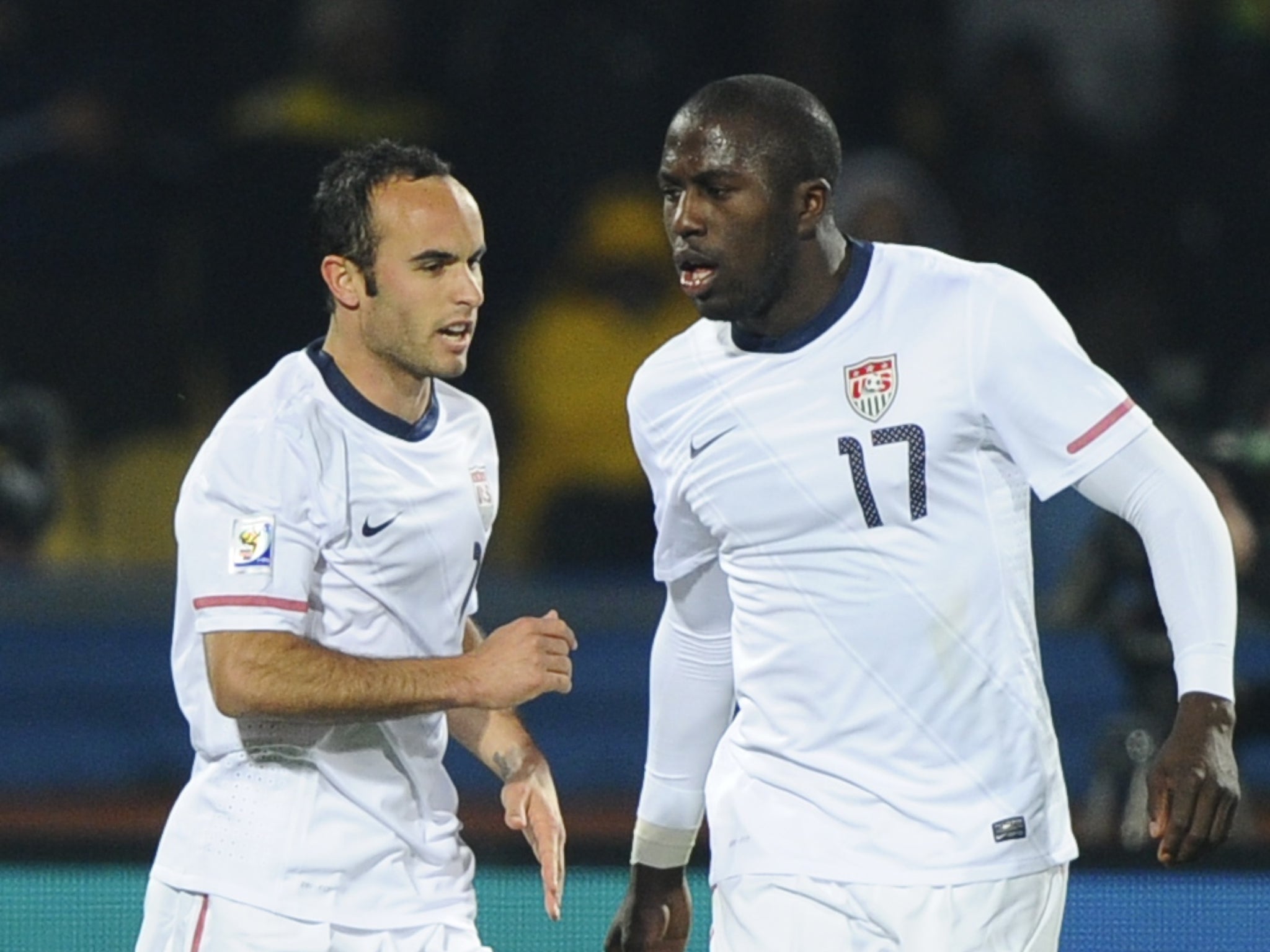 US midfielder Landon Donovan (L) celebrates after scoring with US striker Jozy Altidore during the 2010 World Cup round of 16 football match USA vs. Ghana o