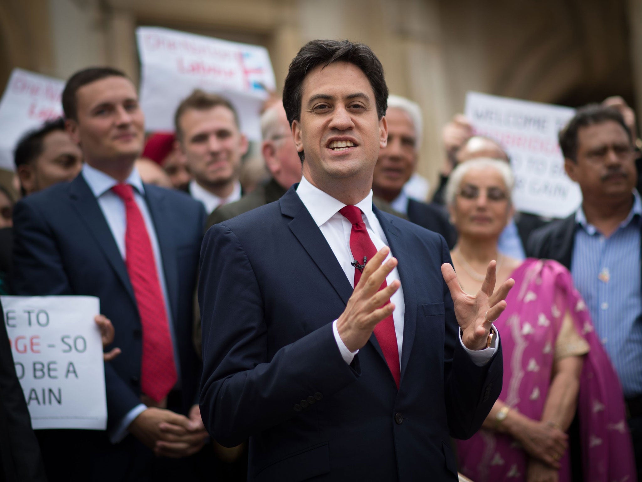 Labour leader Ed Miliband is greeted by supporters and councillors at Redbridge Town Hall in Ilford, Essex