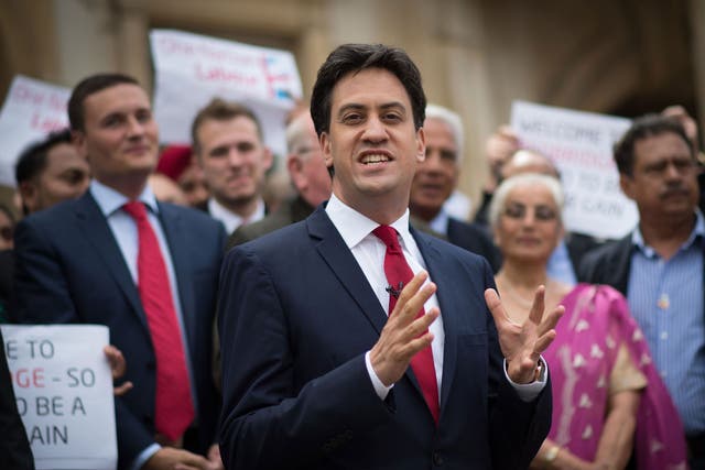Labour leader Ed Miliband is greeted by supporters and councillors at Redbridge Town Hall in Ilford, Essex 