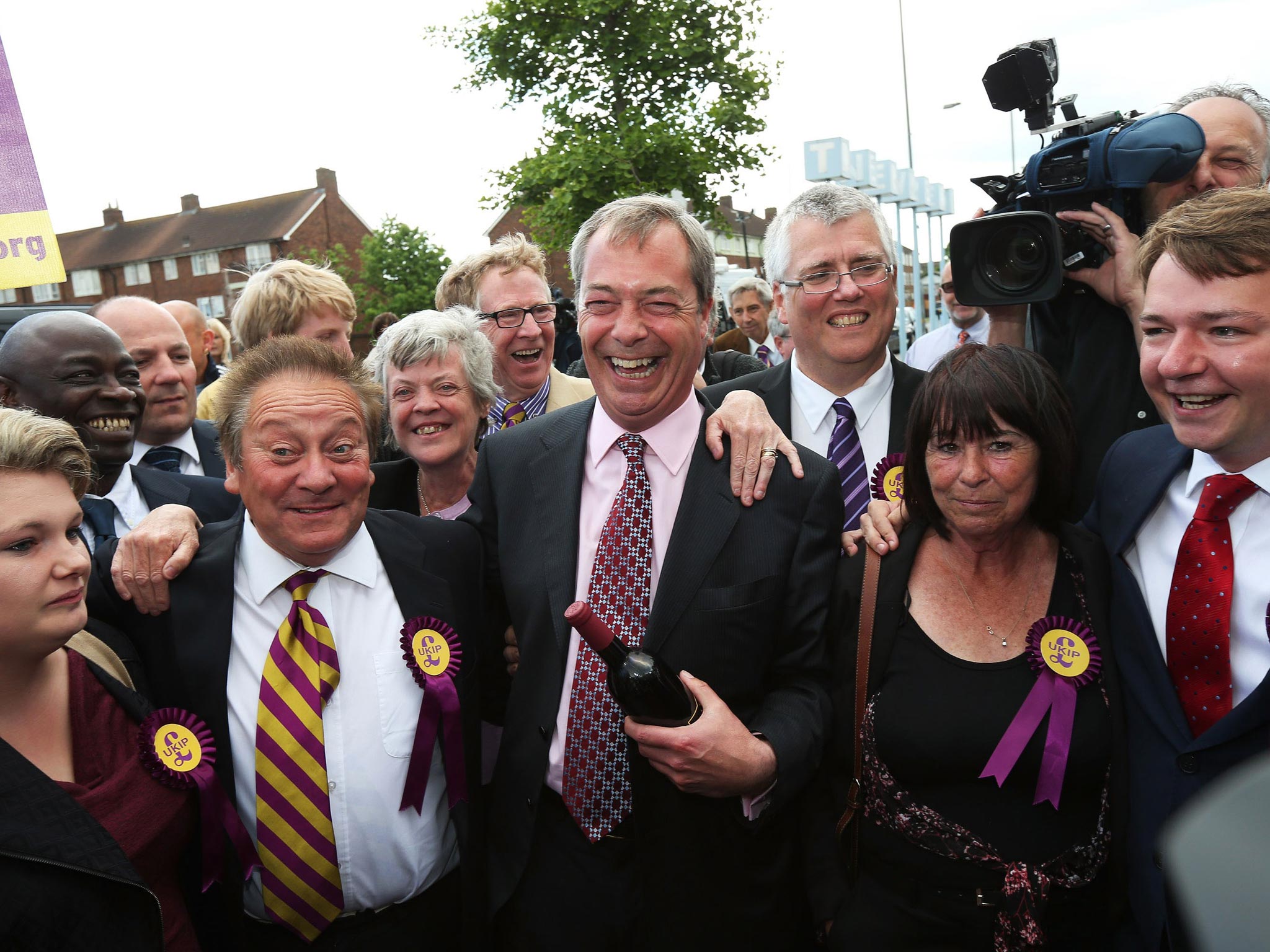 Nigel Farage celebrates with local councillors in South Ockenden