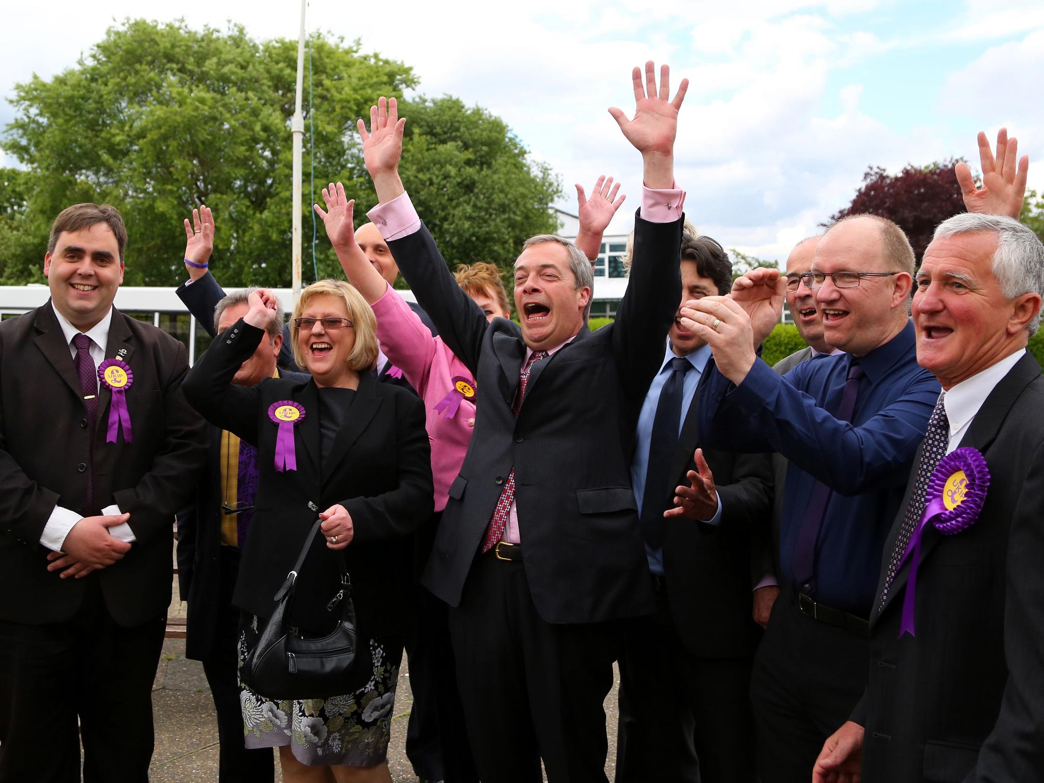 Ukip party leader Nigel Farage with his new councilors during a visit to Basildon, Essex