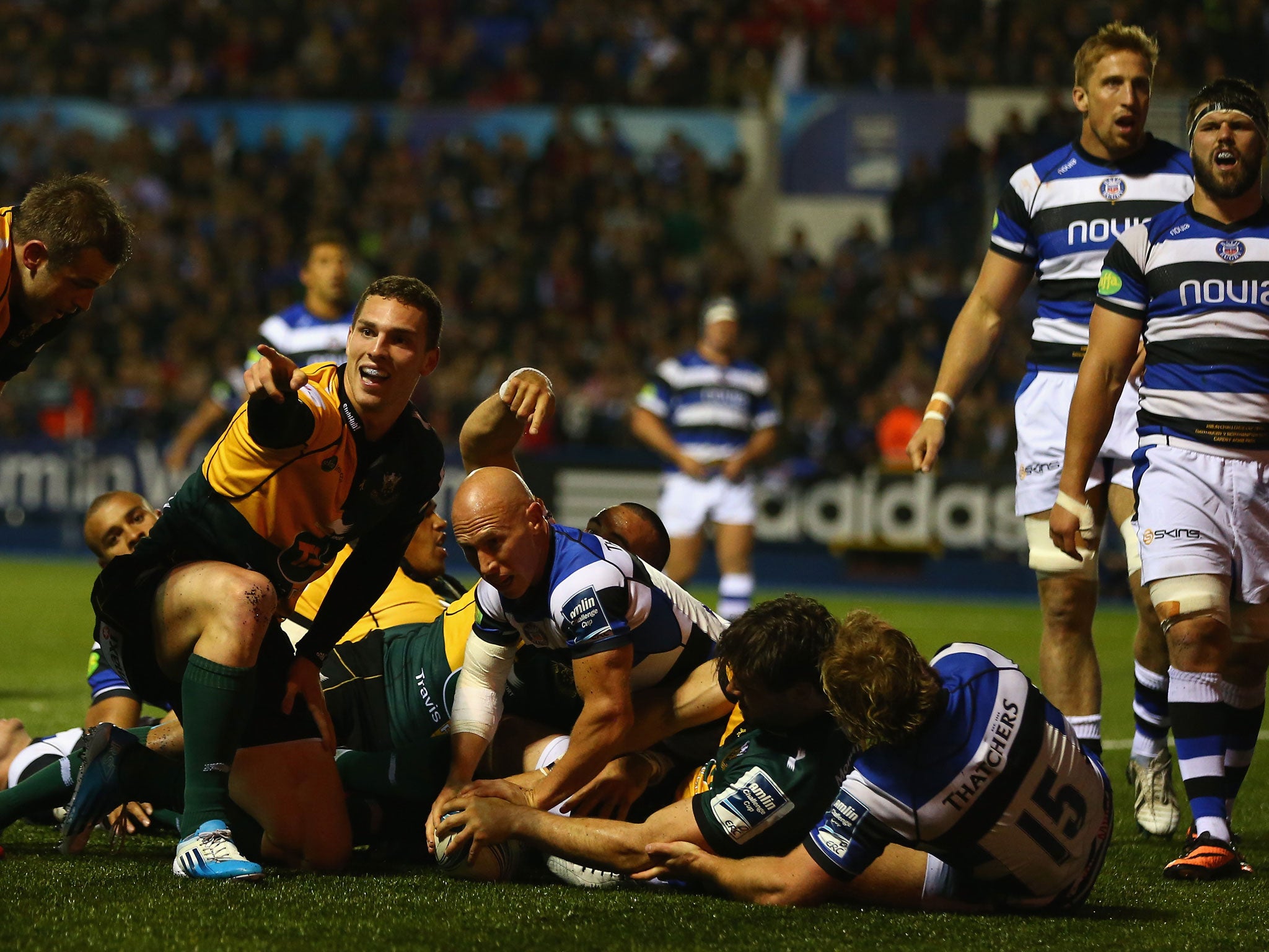 Ben Foden (second right) scores Saints' second try late on to seal their victory