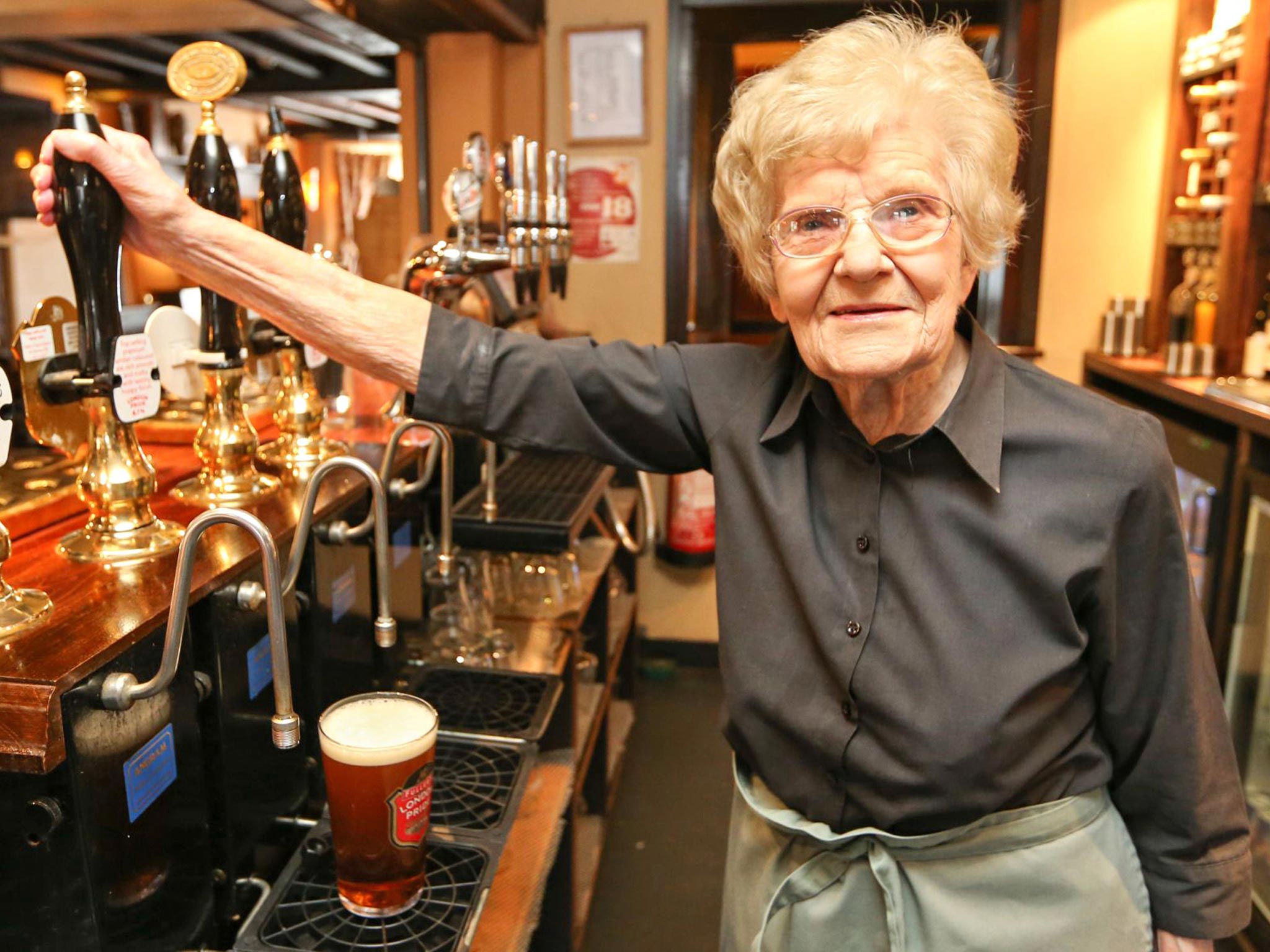 One hundred years of age and a great-great-grandmother, Dolly, from Wendover, Buckinghamshire, is known as the “oldest barmaid in the world”. She has been pulling pints at the Red Lion Hotel for 75 years and still does three shifts a week. Dolly says she