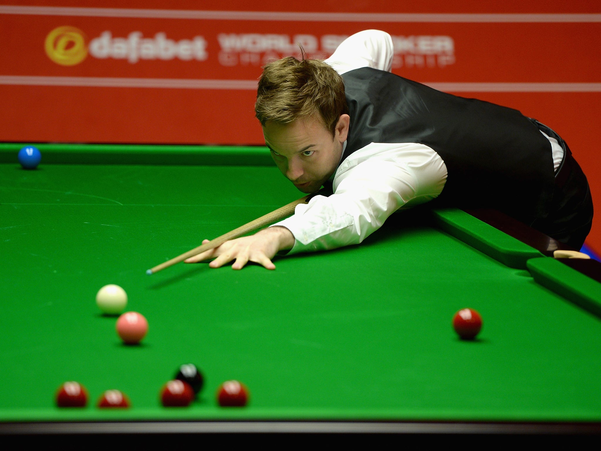 Ali Carter in action against Mark Selby during the second round of The Dafabet World Snooker Championship at Crucible Theatre on April 25, 2014 