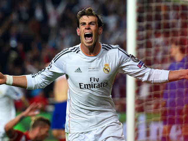 Gareth Bale celebrates scoring the winning goal in the Champions League final